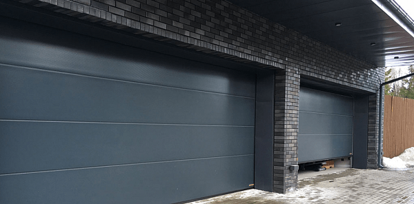 Сколько стоят секционные ворота в 2026 году - сравнение брендов Doorhan, Zivex, Alutech, Zaiger